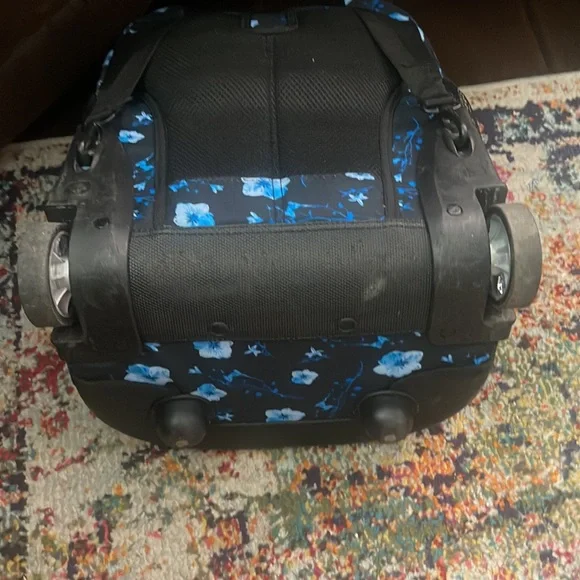 Floral rolling backpack